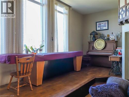 Living area - old stage from schoolhouse- storage underneath - 1635 Lakeshore Road, Clear Creek, ON 
