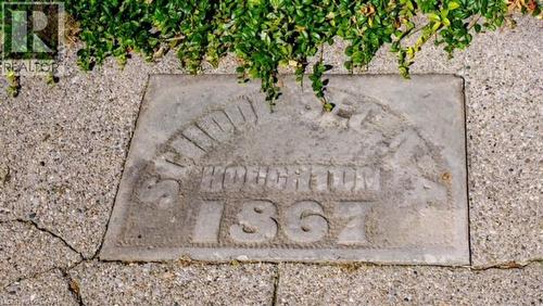 Plaque from original schoolhouse - 1635 Lakeshore Road, Clear Creek, ON 