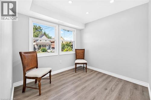 Recessed lighting, wood-finish flooring, white trim, and two windows - 4 Albemarle Street, Hamilton, ON 