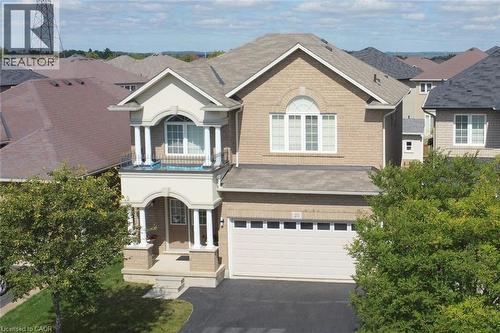 Brick and stucco exterior with an arched entryway - 25 Guest Street, Hamilton, ON 