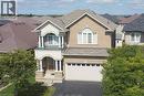 Brick and stucco exterior with an arched entryway - 25 Guest Street, Hamilton, ON 