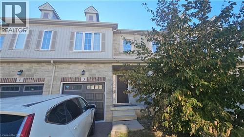 Stone and siding exterior with decorative shutters - 3 Sharp Drive, Ancaster, ON 