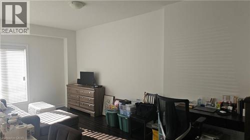 Recessed window with horizontal blinds, dark wood-finish flooring, and light-toned walls - 3 Sharp Drive, Ancaster, ON 