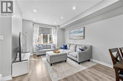 Recessed lighting, wood-finish flooring, and white trim - 1890 Rymal Road E Unit# 144, Hamilton, ON 