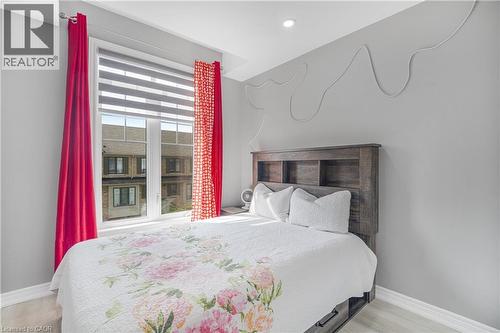 Recessed ceiling lighting, light wood-finish flooring, and a window with blinds - 1890 Rymal Road E Unit# 144, Hamilton, ON 
