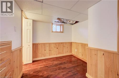 Wood-finish flooring with natural wood paneling - 174 Bridgeport Road E, Waterloo, ON 