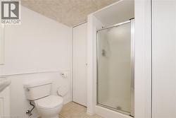 Basement 3pc bathroom in a neutral tone - 