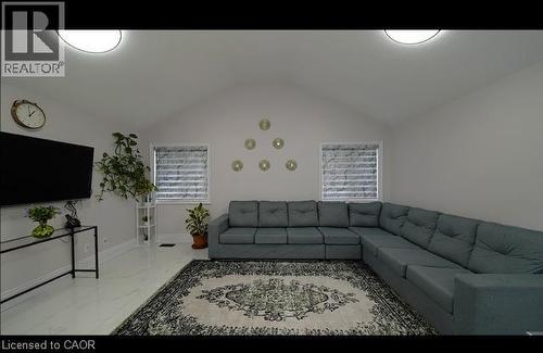 Vaulted ceiling with flush-mount lighting - 643 Doon South Drive, Kitchener, ON 