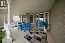Covered front porch featuring brick exterior - 61 Sunnyside Drive, St. George, ON 
