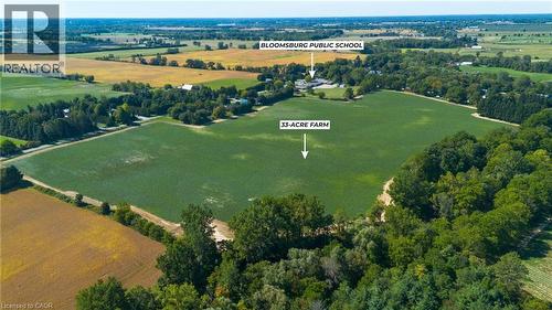 33-acre farm parcel surrounded by agricultural fields and mature trees - 264 Old Highway 24, Waterford, ON 