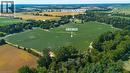 33-acre farm parcel surrounded by agricultural fields and mature trees - 264 Old Highway 24, Waterford, ON 