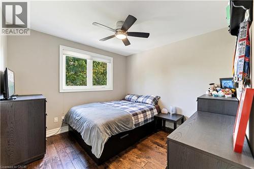 Fan, oversized window, hardwood flooring. - 58 Uplands Avenue, Hamilton, ON 