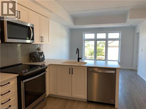 195 COMMONWEALTH Street Unit# 209 , Kitchener, Ontario N2E 0H5 2