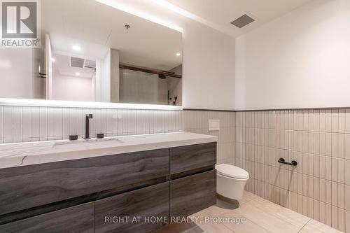 301 - 778 QUEEN STREET E , Toronto, Ontario M4M 1H4 5