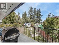 View of the backyard with a storage shed. - 