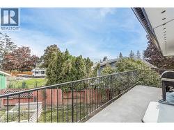 Fenced backyard with fruit trees and room for a garden - 