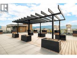Amenities include a rooftop terrace. - 