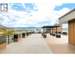 Amenities include a rooftop terrace. - 