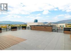 Amenities include a rooftop terrace. - 