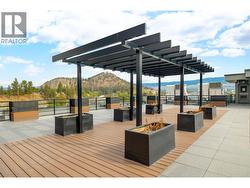 Amenities include a rooftop terrace. - 