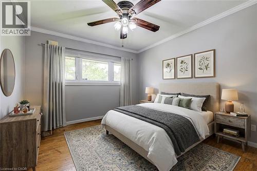 Wood-finish flooring with crown molding - 192 Warren Road, Kitchener, ON 