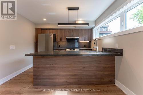 5 - 352 JONES AVENUE , Toronto, Ontario M4J 3G3 2