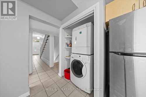Main floor laundry with shelving - 118 King Edward Avenue, Ottawa, ON 