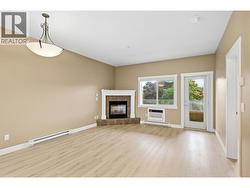 Large window and access to the east-facing balcony - 