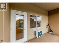 Covered balcony with a Phantom screen for comfortable outdoor living - BBQs Allowed! - 