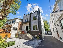 293 RHODES AVENUE Toronto, ON M4L 3A4