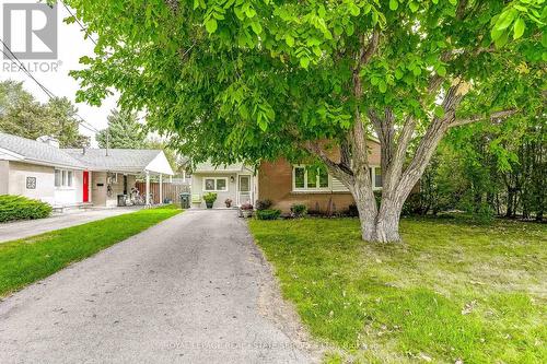 FRONT YARD & LONG DRIVEWAY - 27 Sora Drive, Mississauga, ON 