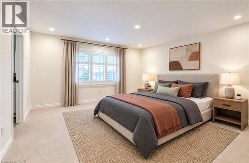 Shower with glass enclosure, single vanity with brown marble-finish countertop, white cabinetry with dark hardware, and light-tone wood-finish flooring - 52 Pointer Street, Cambridge, ON 