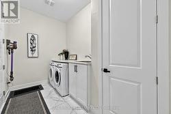 Laundry Room with Garage Access - 