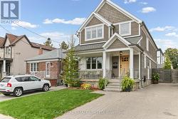 106 TIAGO AVENUE  Toronto, ON M4B 2A3