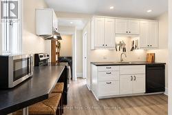 AI edited to remove clutter in kitchen - 