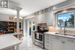 Kitchen with w/ot to backyard - 