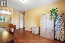 2nd Bedroom with mirrored closet doors - 
