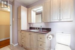 Lots of cupboards in bathroom - 