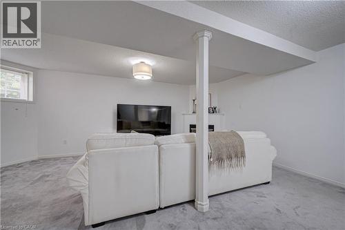 Recessed window, ceiling-mounted light fixture, and column detail - 317 Christopher Drive, Cambridge, ON 