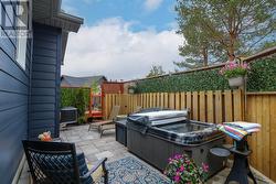 Privacy area created for hot tub off of bedroom. - 