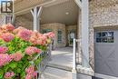 Front covered porch, vinyl low maintenance hand rails. - 222 Chestnut Hill Crescent, Kitchener, ON 