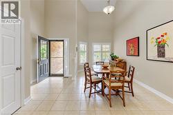 Welcome! Cathedral ceiling entry with dining area & coat closet. - 