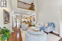 View from Living room to upper loft/family room. - 