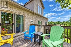 Deck has stairs to ground level. - 