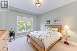 Electronic window blind with window facing the trees. - 