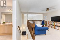 Loft/upper Family room with oak railings. - 