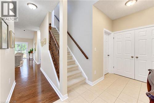 Main floor hallway with stairs to loft. - 222 Chestnut Hill Crescent, Kitchener, ON 