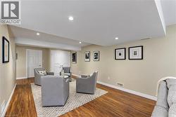 Lots of room for seating or potential spot for a pool table. - 