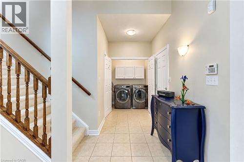 Main floor laundry closet and garage door entry. - 222 Chestnut Hill Crescent, Kitchener, ON 
