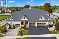 Sky view of block townhouses.  Middle unit is for sale. - 